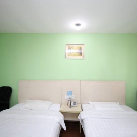 Yixin Business Hotel Гуанджоу Екстериор снимка