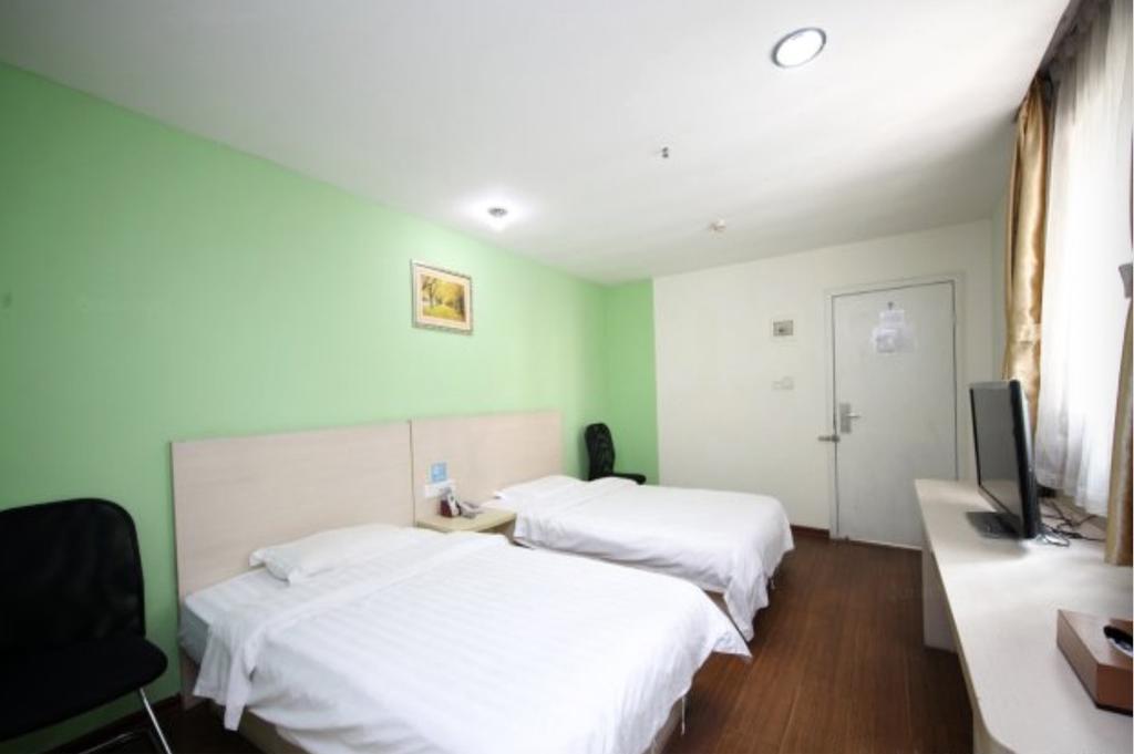 Yixin Business Hotel Гуанджоу Екстериор снимка