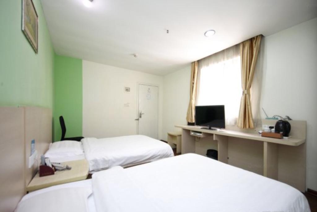 Yixin Business Hotel Гуанджоу Екстериор снимка