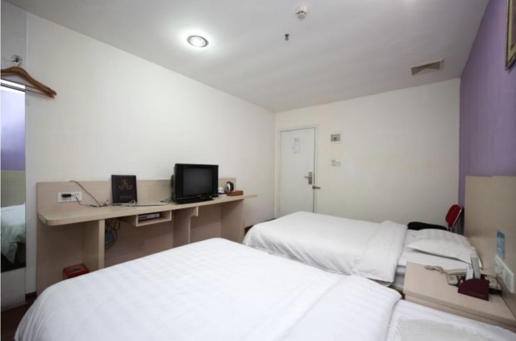 Yixin Business Hotel Гуанджоу Екстериор снимка