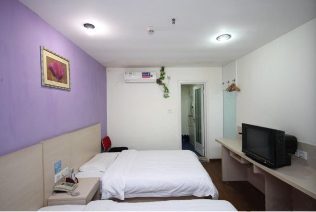 Yixin Business Hotel Гуанджоу Екстериор снимка