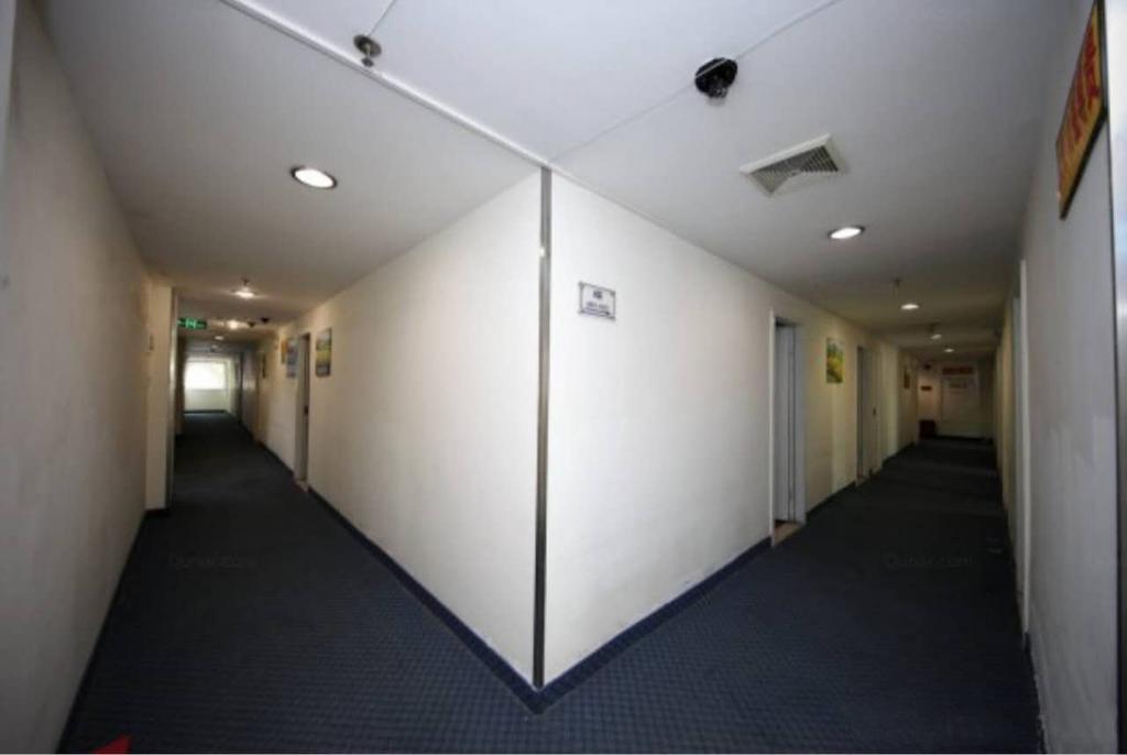 Yixin Business Hotel Гуанджоу Екстериор снимка