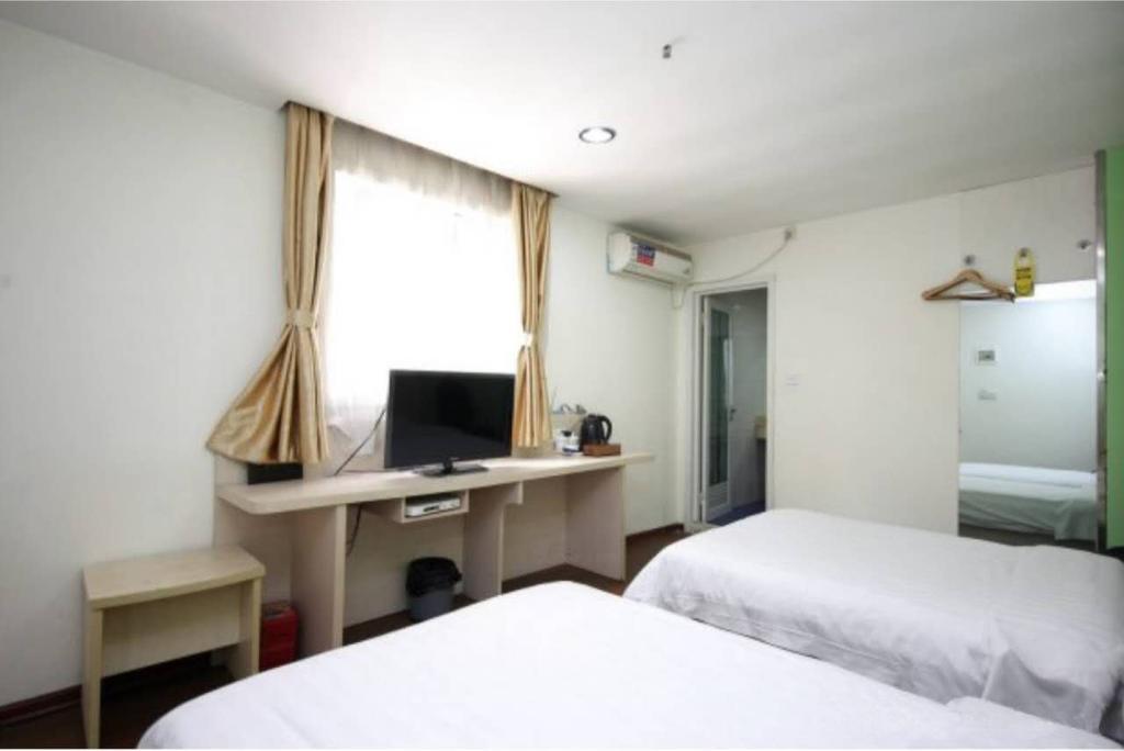 Yixin Business Hotel Гуанджоу Екстериор снимка
