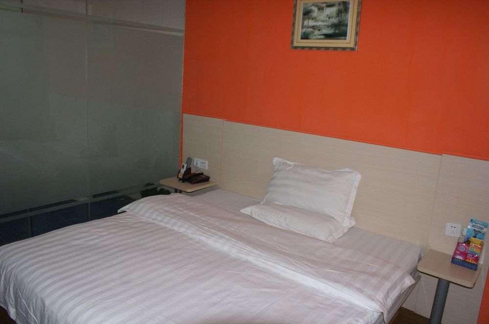 Yixin Business Hotel Гуанджоу Екстериор снимка