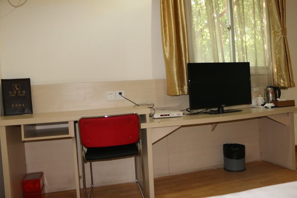 Yixin Business Hotel Гуанджоу Екстериор снимка